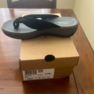 Clark’s black sandals